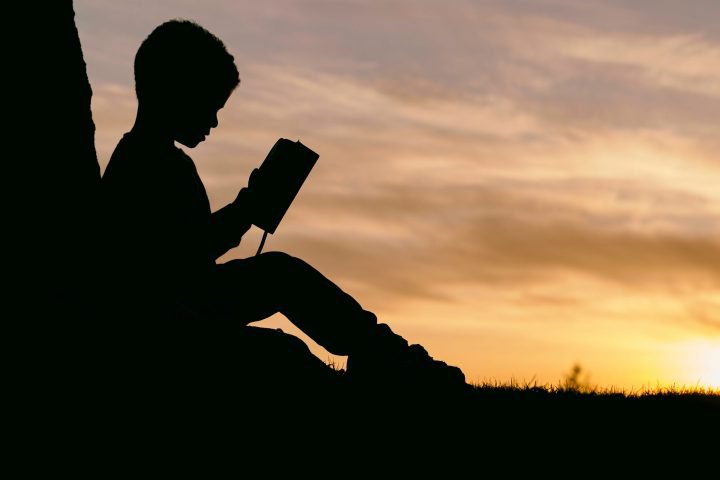 Kid Reading Silhouette